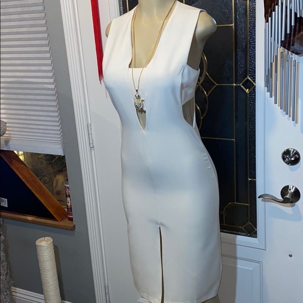 ⭐️⭐️SEXY WHITE MIDI CUT OUT DRESS⭐️⭐️ - Picture 1 of 4